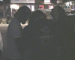 Cody's band, Seven Rise Up, praying before a gig