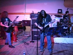 Cody's band, Seven Rise Up, performing
