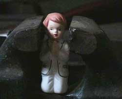 statuette in a vise