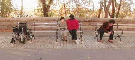 photo of a woman with a nurse outside near central park, ny