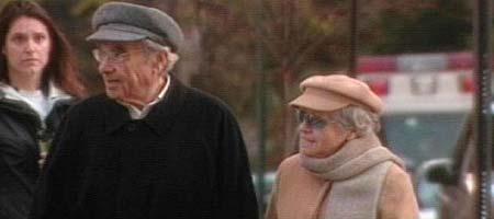 photo of man and woman enjoying the outdoors