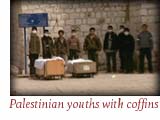 Palestinian youths with coffins