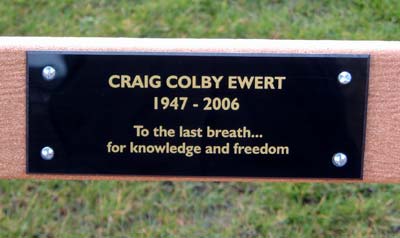nameplate on a bench: craig colby ewert, 1947-2006: to the last breath... for knowledge and freedom