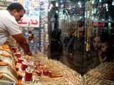 Business | Tomans in Turmoil, Gold Gone Wild 
