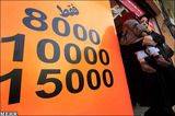 Business | A Swift End for the Innocent: The Sanctions Hit Home 
