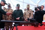 News | Cameraman in Iran's UN Entourage Defects; Rial Dives Deeper